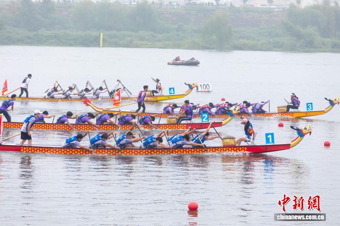 湖南汨罗举行‘汨罗粽子杯’第13届中国大学生龙